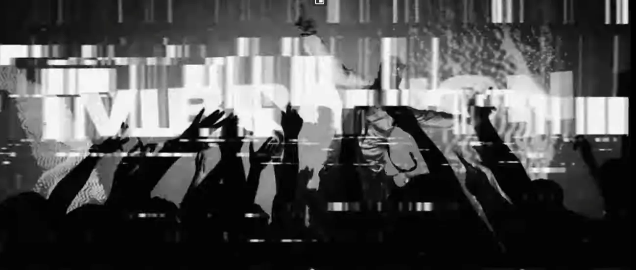 Airplane Boys Change the Vibration music video wide shot with stylized glitch visuals layered over the performance