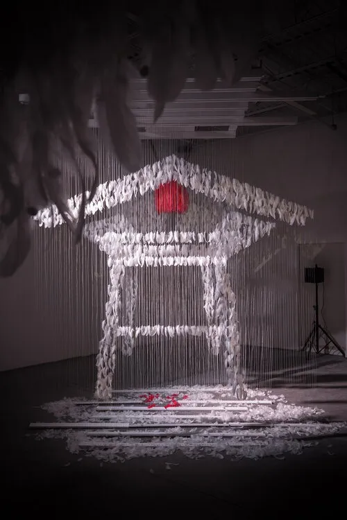 Be Here Now winter season projection with frost and bare-branch imagery mapped across the artwork surface